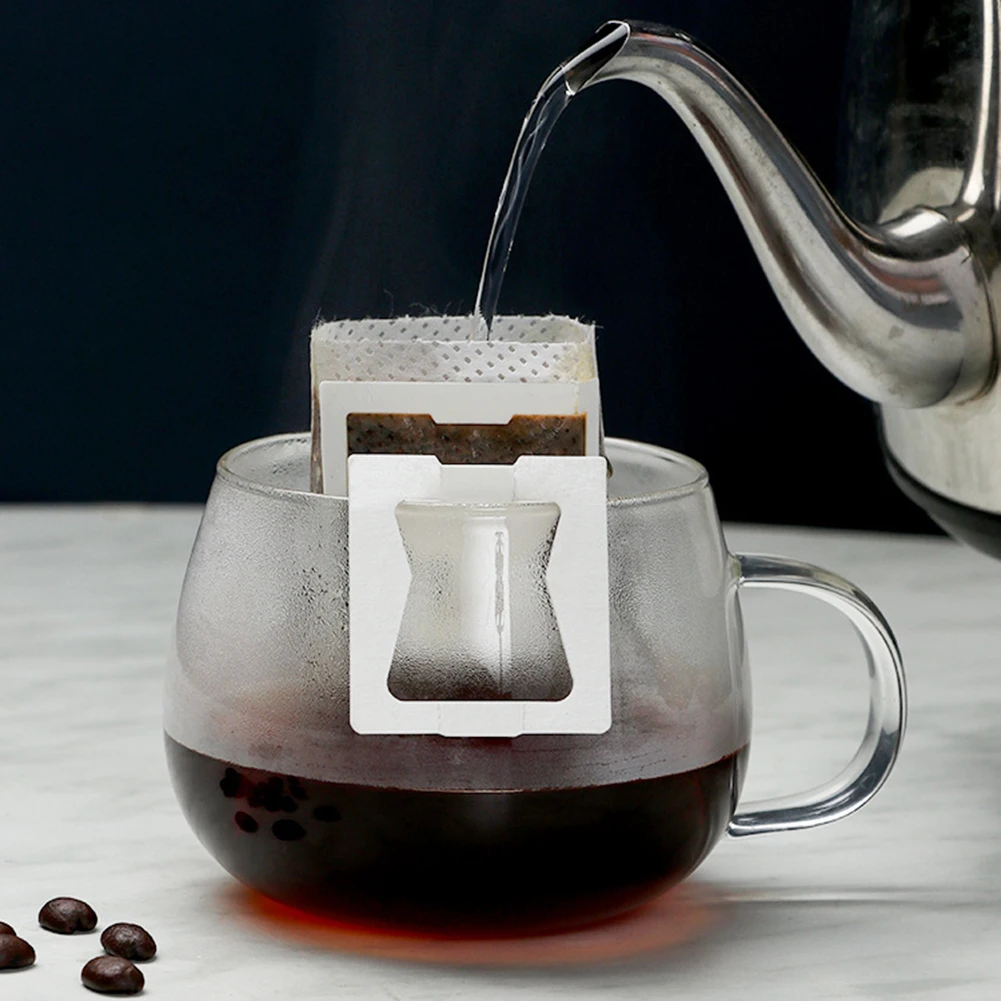 50pcs Coffee Cup Filter Bag 50pcs Hanging Ear Style Thickened Hand Pushed Coffee Powder Filter Paper Bag Office Travel Straine
50pcs Coffee Cup Filter Bag 50pcs Hanging Ear Style Thickened Hand Pushed Coffee Powder Filter Paper Bag Office Travel Straine