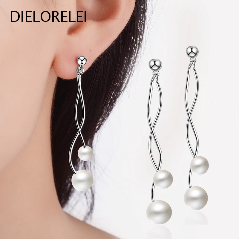 DIELORELEI 925 Sterling Silver Simple Eliminates Metal Allergies Long Wavy Pearl Stud Earrings Minimalist Temperament Girls
DIELORELEI 925 Sterling Silver Simple Eliminates Metal Allergies Long Wavy Pearl Stud Earrings Minimalist Temperament Girls