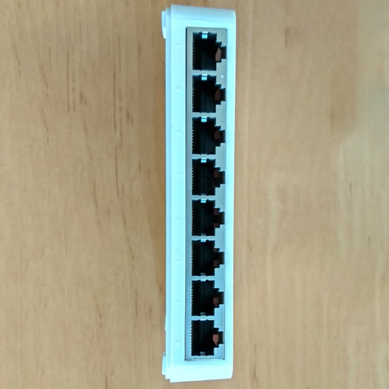 New Model 8 Port Gigabit Switch Desktop RJ45 Ethernet Switch 10/100/1000Mbps Lan Hub Switch 8 Portas EU Plug
New Model 8 Port Gigabit Switch Desktop RJ45 Ethernet Switch 10/100/1000Mbps Lan Hub Switch 8 Portas EU Plug