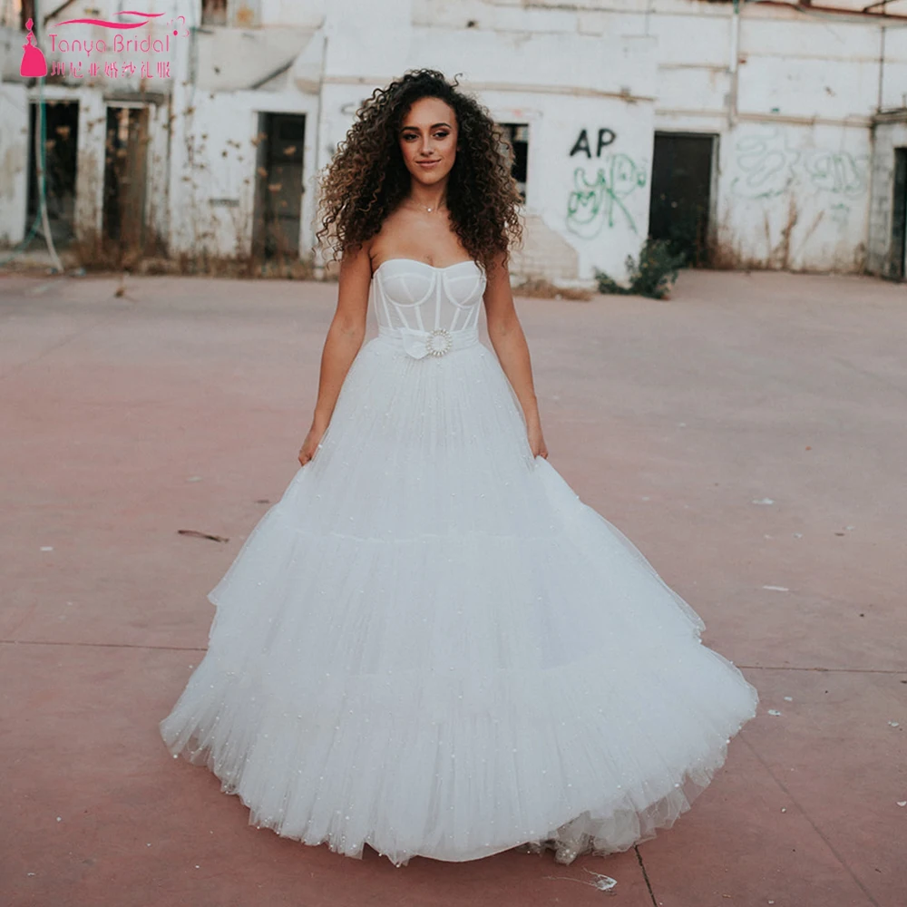 A Line Pearls Wedding Dresses Tiered Skirt Sweetheart Luxury Beads Bridal Gowns Elegant Robe de soriee ZW369
A Line Pearls Wedding Dresses Tiered Skirt Sweetheart Luxury Beads Bridal Gowns Elegant Robe de soriee ZW369