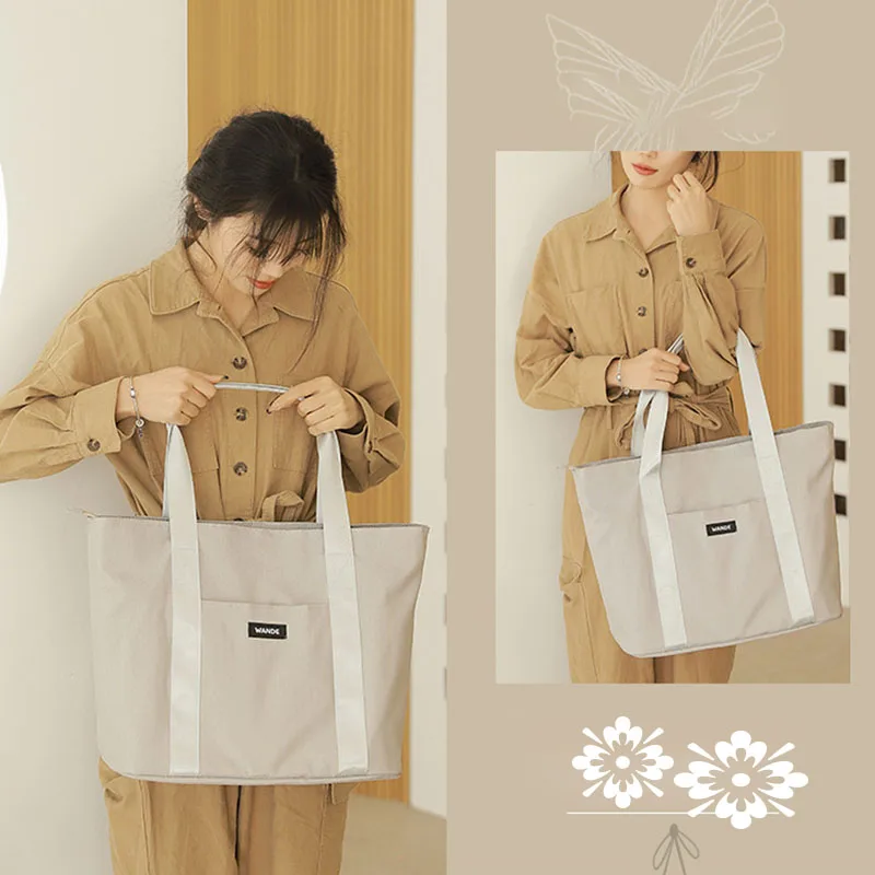 New Women's Simple Shopping Travel Tote Bag Exquisite Personalized Commuter Shoulder Bag Casual All-match Large-capacity Satchel 
New Women's Simple Shopping Travel Tote Bag Exquisite Personalized Commuter Shoulder Bag Casual All-match Large-capacity Satchel