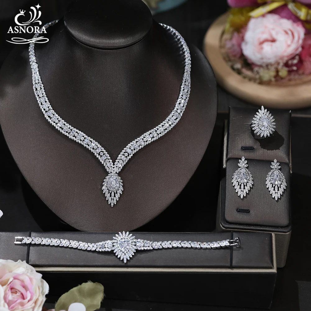 Роскошный комплект из 4 шт. ювелирных изделий Dubai Bride CZ ожерелье с подвеской в виде капли воды Новый Модный Полный комплект ювелирных изделий ...
Роскошный комплект из 4 шт. ювелирных изделий Dubai Bride CZ ожерелье с подвеской в виде капли воды Новый Модный Полный комплект ювелирных изделий ...