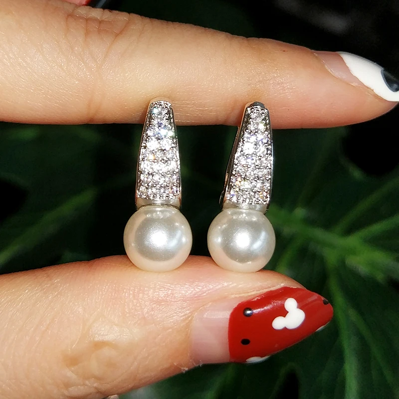 Fashion Tiny CZ Zircon Pave & Round Simulated Pearl Hoop Earrings for Women Newly Issued Wedding Jewelry
Fashion Tiny CZ Zircon Pave & Round Simulated Pearl Hoop Earrings for Women Newly Issued Wedding Jewelry