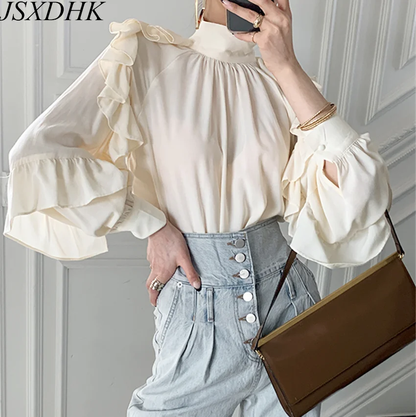 JSXDHK 2021 New Chic Korean Autumn Shirt Tops Elegant Women Chiffon Ruffles Lantern Sleeve Female Stand Collar Loose Blouses
JSXDHK 2021 New Chic Korean Autumn Shirt Tops Elegant Women Chiffon Ruffles Lantern Sleeve Female Stand Collar Loose Blouses