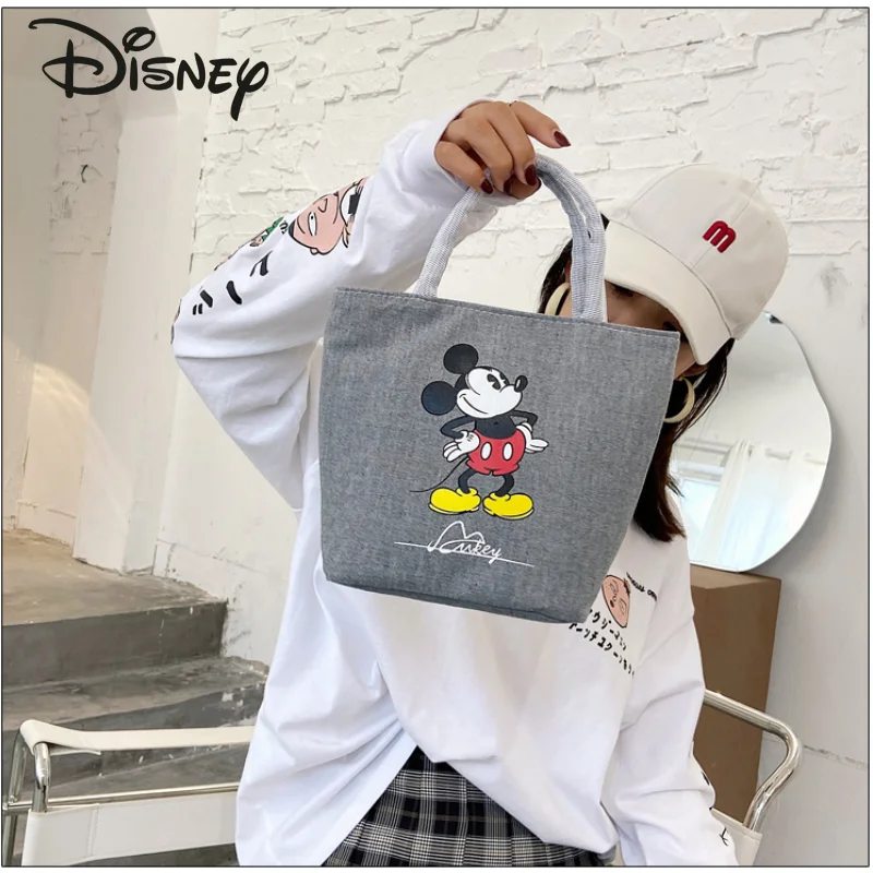 Disney's New Mickey Hot Sale Ladies Handbags High-capacity High-quality Fashion Casual Student Canvas Storage Bag Lunch Bag
Disney's New Mickey Hot Sale Ladies Handbags High-capacity High-quality Fashion Casual Student Canvas Storage Bag Lunch Bag