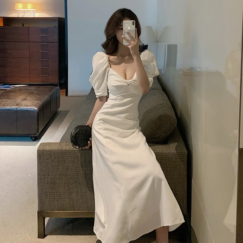 White Waisted Fairy Girl Skirt Front Chest Twist Design Waisted Women Dress Puff Sleeves Big Swing Skirts Female Summer 2021
White Waisted Fairy Girl Skirt Front Chest Twist Design Waisted Women Dress Puff Sleeves Big Swing Skirts Female Summer 2021