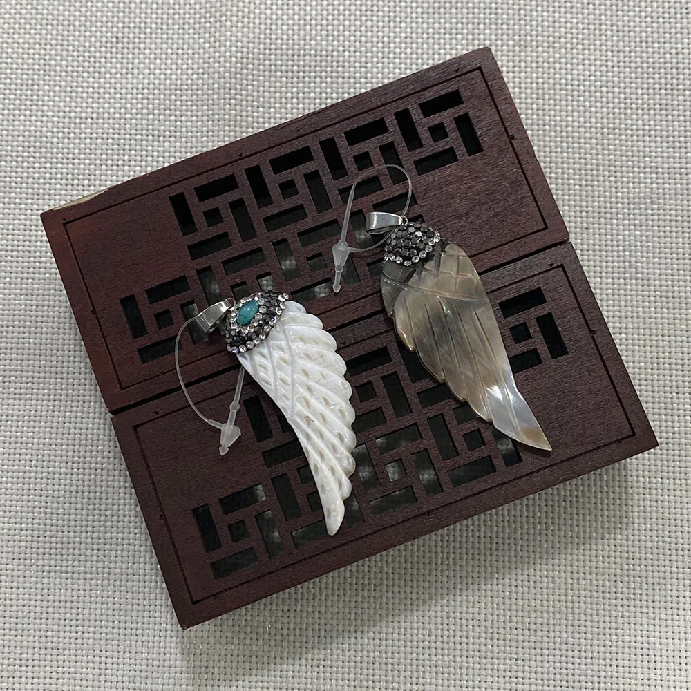 Natural Shell Pendant Wing Shape Inlaid Rhinestones Suitable for Making Exquisite Charm Crafts Jewelry Accessories Wholesale
Natural Shell Pendant Wing Shape Inlaid Rhinestones Suitable for Making Exquisite Charm Crafts Jewelry Accessories Wholesale