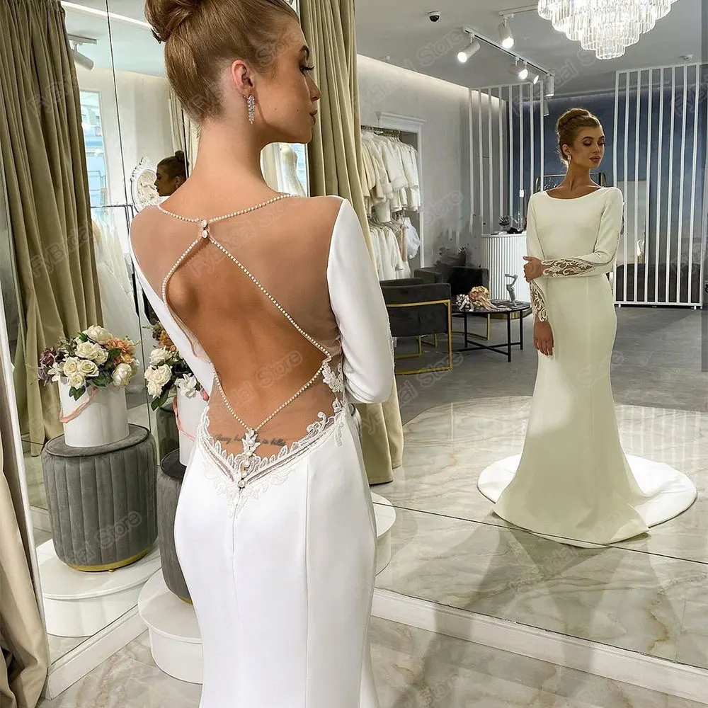 Elegant Mermaid Wedding Dress O Neck Long Sleeve Sexy Cut Out Illusion Back Bridal Gown Beading Lace Appliques Custom Made 2021
Elegant Mermaid Wedding Dress O Neck Long Sleeve Sexy Cut Out Illusion Back Bridal Gown Beading Lace Appliques Custom Made 2021