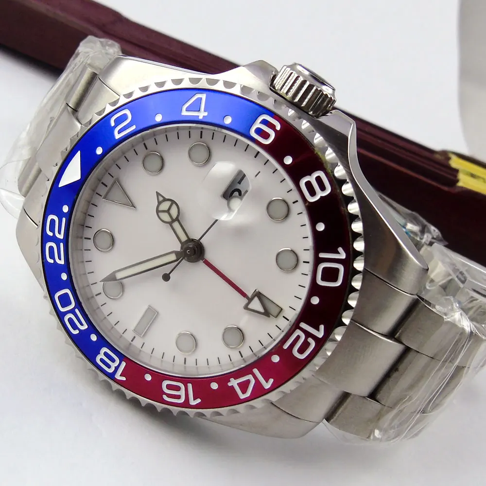 40MM White Sterile Dial Sapphire Glass Date Luminous Red Blue Bezel Steel Deployment Bracelet GMT Automatic Movement Men's Watch
40MM White Sterile Dial Sapphire Glass Date Luminous Red Blue Bezel Steel Deployment Bracelet GMT Automatic Movement Men's Watch