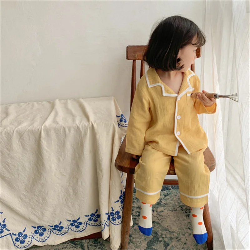 Spring Autumn Boys And Girls Solid Color Cotton Loungewear Children Long Sleeve Tops And Pants 2pcs sets Pajamas Clothing 
Spring Autumn Boys And Girls Solid Color Cotton Loungewear Children Long Sleeve Tops And Pants 2pcs sets Pajamas Clothing