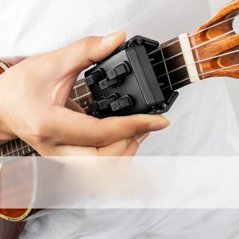 Acoustic Guitar Chord Buddy Teaching Aid Guitar Tools Guitar Learning System Teaching Aid Accessories for Ukulele Beginner
Acoustic Guitar Chord Buddy Teaching Aid Guitar Tools Guitar Learning System Teaching Aid Accessories for Ukulele Beginner