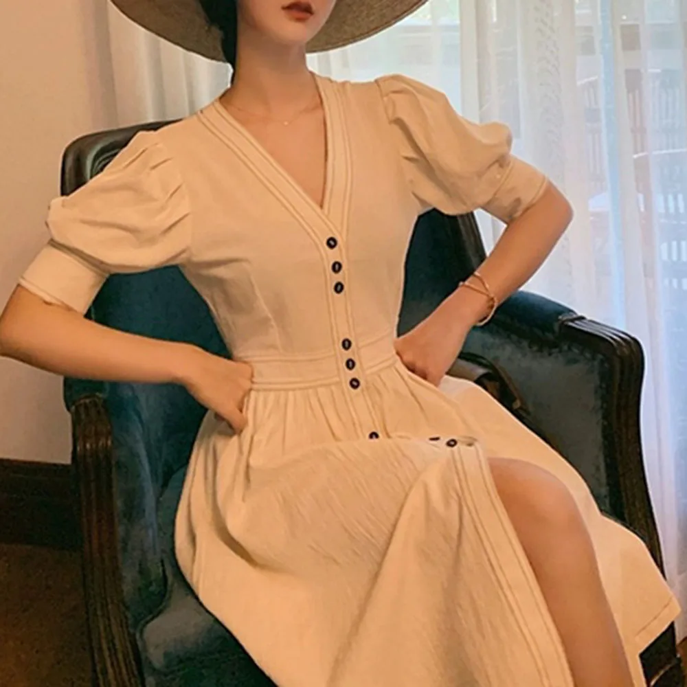 2021 Summer New Women's Retro Commuter Fashion Simple Style Long Dress French Single-breasted Waist Lantern Sleeve Skirt 
2021 Summer New Women's Retro Commuter Fashion Simple Style Long Dress French Single-breasted Waist Lantern Sleeve Skirt