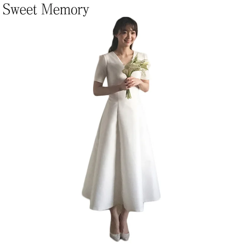 J1115 Sweet Memory Satin Simple White Wedding Dress 2021 Short Sleeve V-Neck Tea-Length Wedding Party Vestidos Women Long Gown 
J1115 Sweet Memory Satin Simple White Wedding Dress 2021 Short Sleeve V-Neck Tea-Length Wedding Party Vestidos Women Long Gown