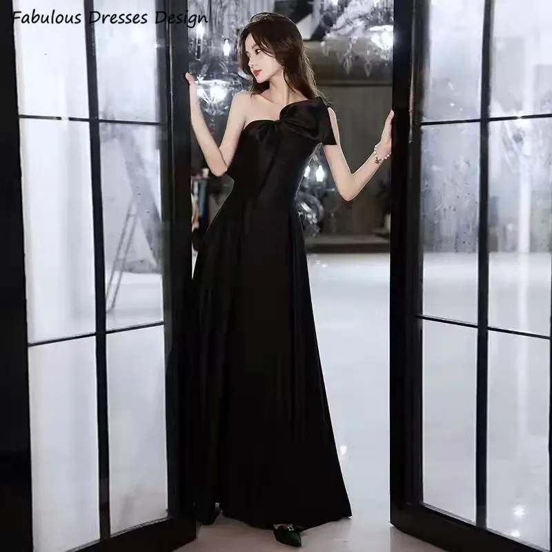 Formal Black Long Bridesmaid Dresses A Line Big Bowknot One Shoulder Wedding Party Dress 2022 Custom Made Prom Gowns
Formal Black Long Bridesmaid Dresses A Line Big Bowknot One Shoulder Wedding Party Dress 2022 Custom Made Prom Gowns