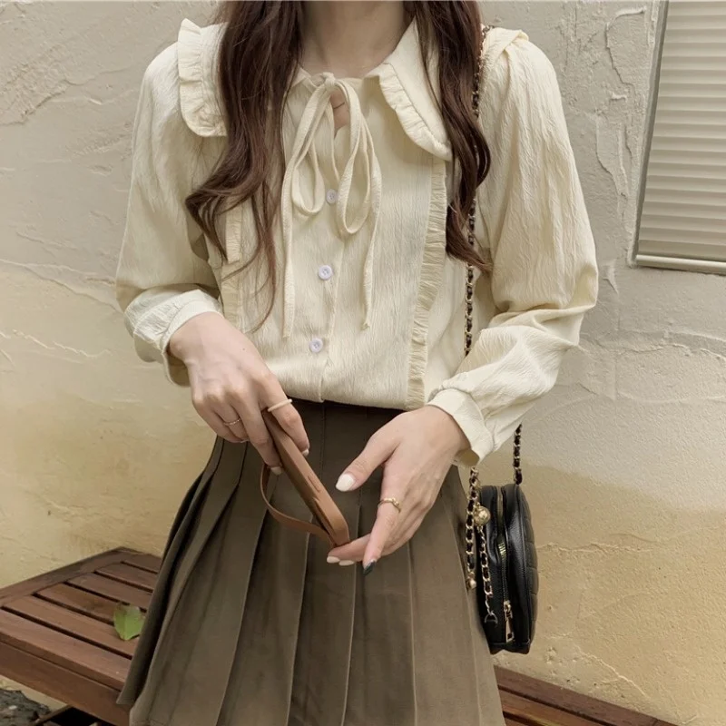 French shirt autumn women's design sense niche top new 2021 fungus edge Lapel doll collar Long Sleeve Shirt
French shirt autumn women's design sense niche top new 2021 fungus edge Lapel doll collar Long Sleeve Shirt