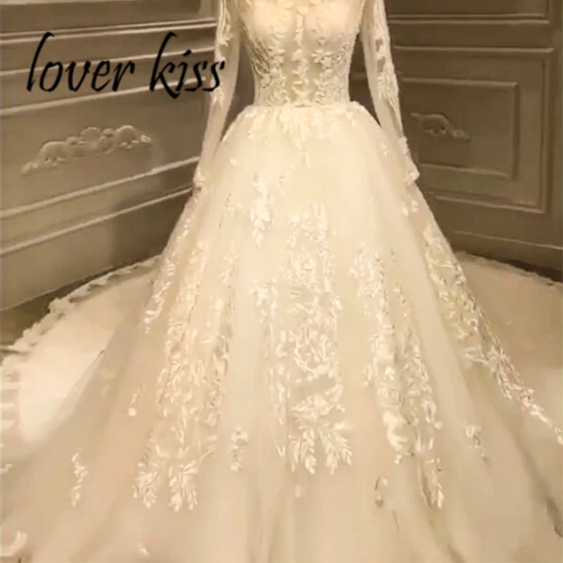 Lover Kiss Vestido De Noiva Real Photos Sheer Tulle Wedding Dress Long Sleeves Beaded Lace Ball Bridal Gowns Sexy Abito da sposa
Lover Kiss Vestido De Noiva Real Photos Sheer Tulle Wedding Dress Long Sleeves Beaded Lace Ball Bridal Gowns Sexy Abito da sposa