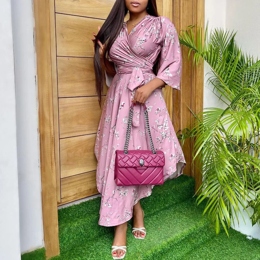 Pink Floral Print African Women Dress Summer 2021 Flare Sleeve Asymmetry Office Dresses with Belt Bohemia Casual Women's Robe
Pink Floral Print African Women Dress Summer 2021 Flare Sleeve Asymmetry Office Dresses with Belt Bohemia Casual Women's Robe
