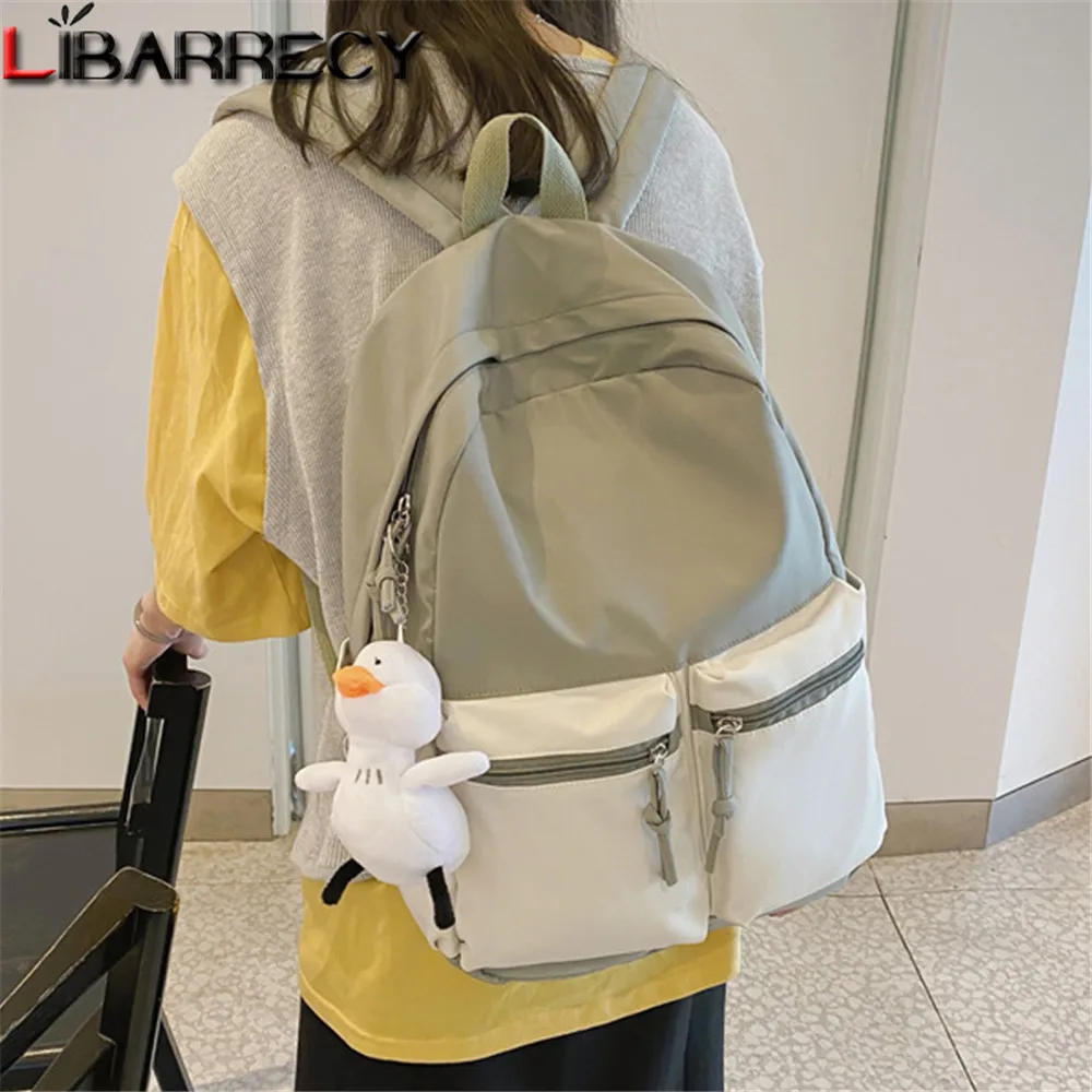 High Quality Nylon Women's Backpack Panelled Designer New Ladies Student Schoolbag Cute Pendant Teen Laptop Backpack Bolso Mujer
High Quality Nylon Women's Backpack Panelled Designer New Ladies Student Schoolbag Cute Pendant Teen Laptop Backpack Bolso Mujer