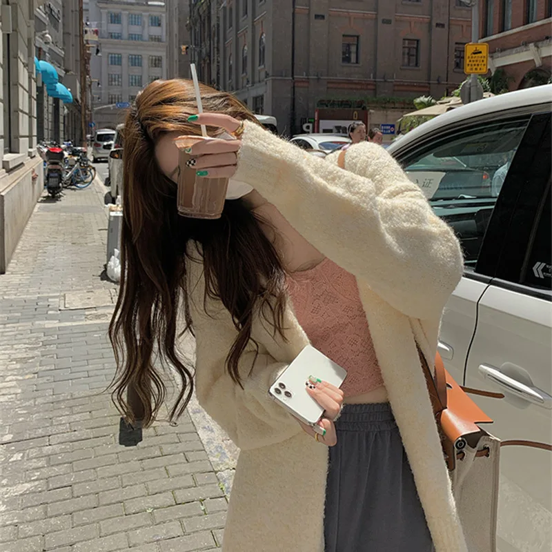 2021 Long sleeve Sweater Cardigan for women's fall/winter wear loose and lazy v-neck cashmere sweater coat 
2021 Long sleeve Sweater Cardigan for women's fall/winter wear loose and lazy v-neck cashmere sweater coat