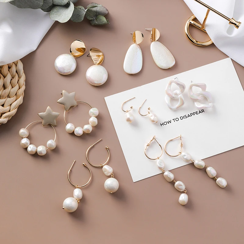 Personalized all-match jewelryRetro Colorful Imitation Pearls Shell Irregular Earrings Simple Star Metal Earrings for Women 2020
Personalized all-match jewelryRetro Colorful Imitation Pearls Shell Irregular Earrings Simple Star Metal Earrings for Women 2020
