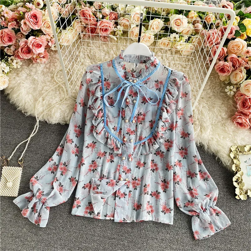Spring Autumn New Loose Elegant Blouse Women's Ruffles Stand Collar Floral Trumpet Sleeve Chiffon Shirt Elegant OL Blouse Feme
Spring Autumn New Loose Elegant Blouse Women's Ruffles Stand Collar Floral Trumpet Sleeve Chiffon Shirt Elegant OL Blouse Feme