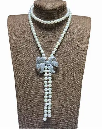 

Hand knotted Luxury female long feather accessories 8-9mm white freshwater pearl necklace sweater chain