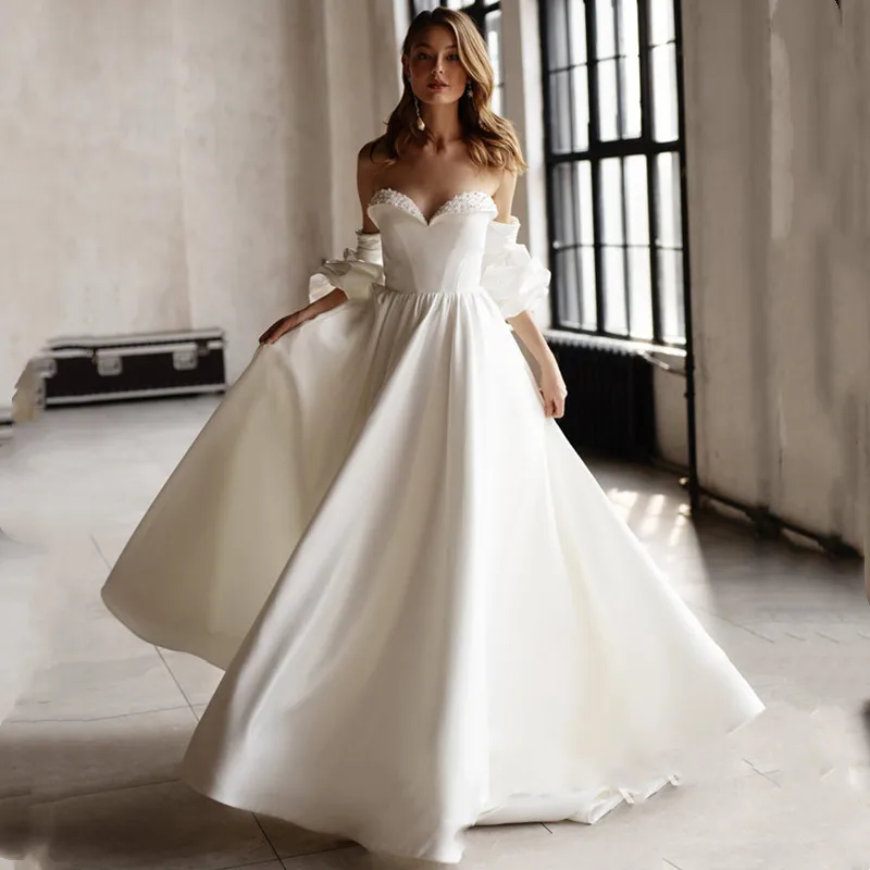 Sweetheart Three Quarter Sleeves Wedding Dress 2021 New Elegant Satin Backless A-Line Sweep Train For Women Sashes Bride Gown
Sweetheart Three Quarter Sleeves Wedding Dress 2021 New Elegant Satin Backless A-Line Sweep Train For Women Sashes Bride Gown