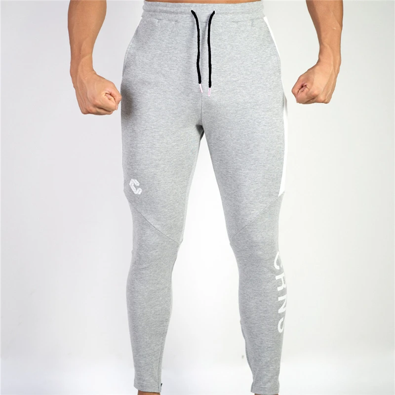 2020 New men's gyms fitness training track pants male cotton bodybuilding training jogging trousers jogging sweatpants
2020 New men's gyms fitness training track pants male cotton bodybuilding training jogging trousers jogging sweatpants