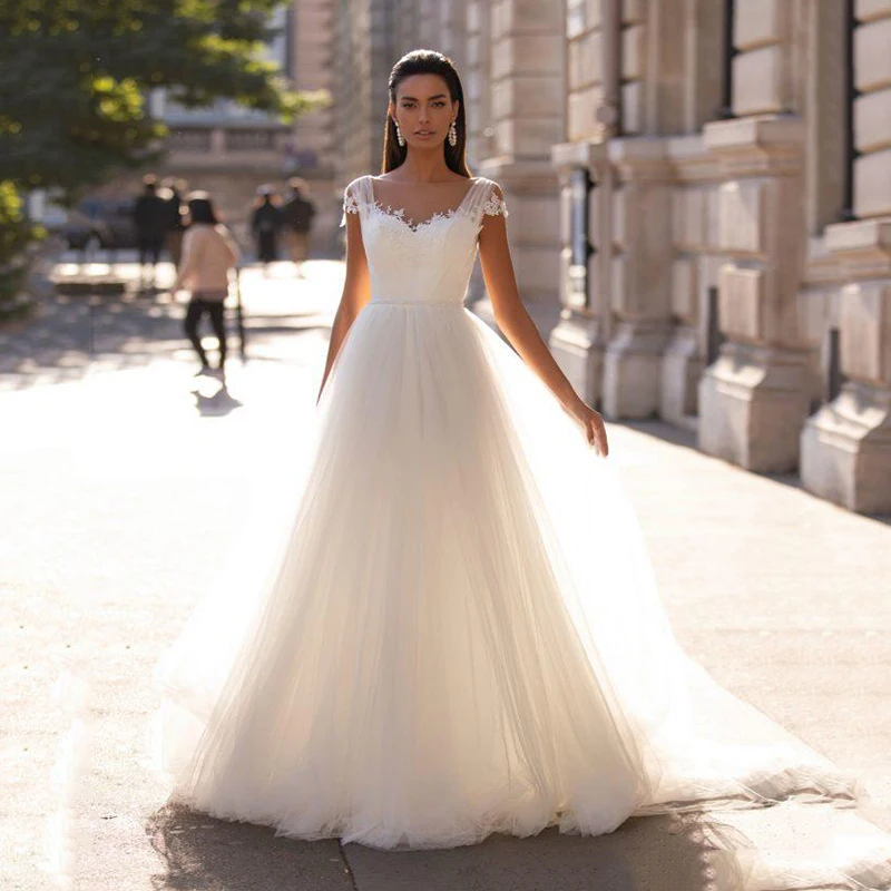 Simple Tulle A Line Lace Applique Cap Sleeves Wedding Dresses Open Back Beach Bridal Gowns Custom Made Boho Wedding Dress 2021
Simple Tulle A Line Lace Applique Cap Sleeves Wedding Dresses Open Back Beach Bridal Gowns Custom Made Boho Wedding Dress 2021