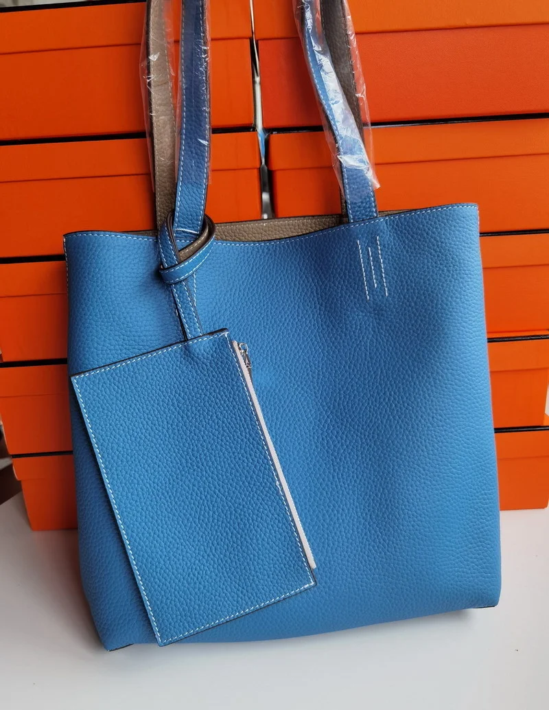 Autumn and winter 2020 new pony h home double sided pitot Bag Orange shopping bag leather women's portable shoulder bag 
Autumn and winter 2020 new pony h home double sided pitot Bag Orange shopping bag leather women's portable shoulder bag