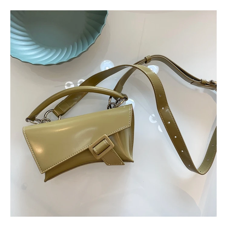 2021 new niche designer portable shoulder slung high-grade leather concave glasses case small bag
2021 new niche designer portable shoulder slung high-grade leather concave glasses case small bag