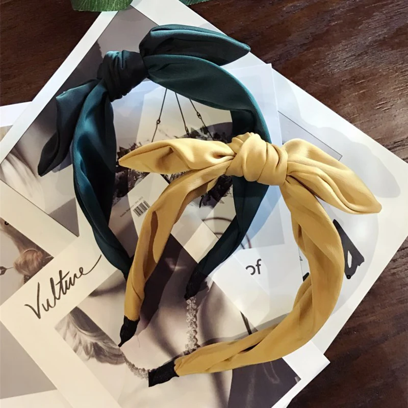 New Korean woman girl headband solid color big bowknot wide-brimmed headband hairpin photo accessories
New Korean woman girl headband solid color big bowknot wide-brimmed headband hairpin photo accessories