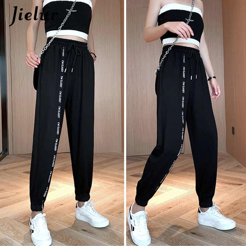 Jielur Letters Black Gray White Sports Pants Women 2020 Summer Casual Loose Straight Trousers S-XL Street Cool Sweatpants Female
Jielur Letters Black Gray White Sports Pants Women 2020 Summer Casual Loose Straight Trousers S-XL Street Cool Sweatpants Female