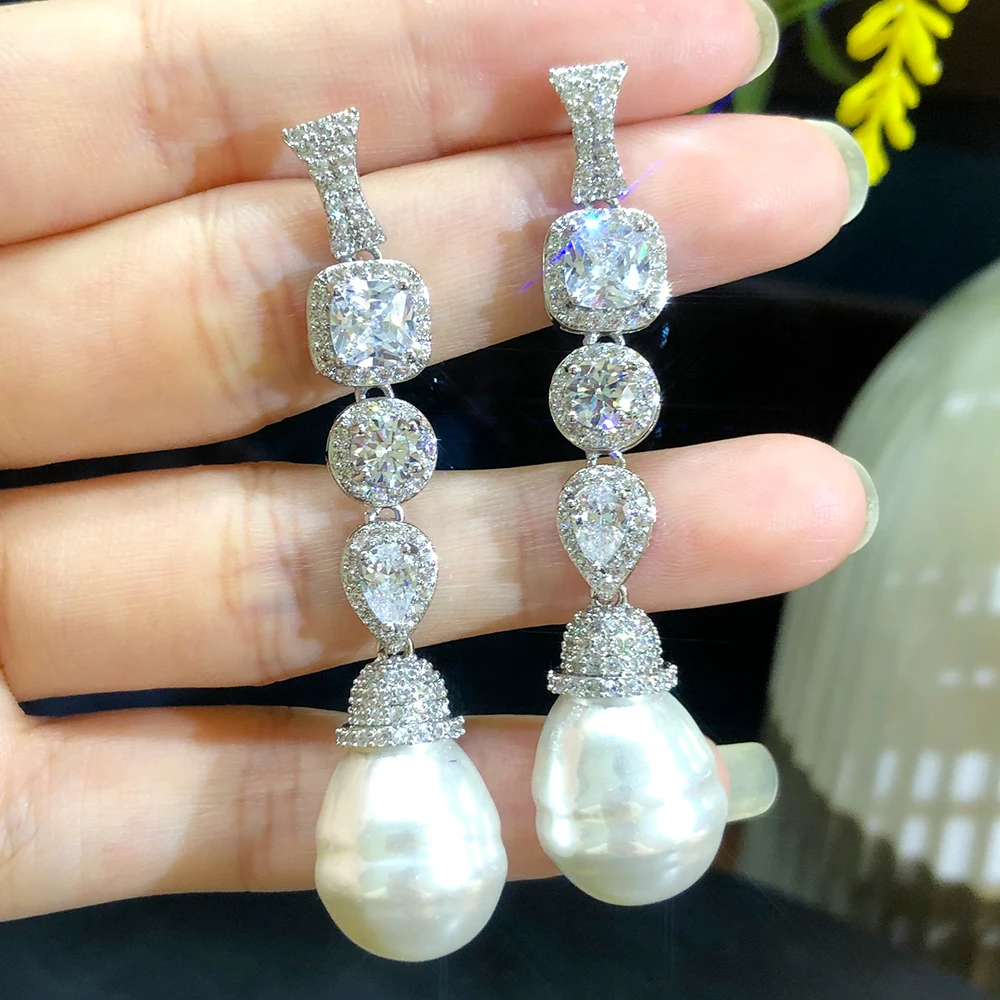 KellyBola New Trendy Luxury High Quality Pearl Pendant Earrings Full CZ Zircon Bridal Wedding Banquet Anniversary Daily Jewelry
KellyBola New Trendy Luxury High Quality Pearl Pendant Earrings Full CZ Zircon Bridal Wedding Banquet Anniversary Daily Jewelry
