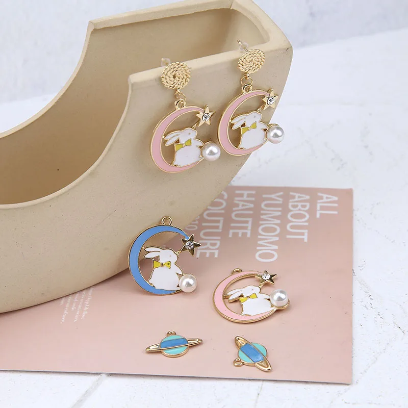 10 pcs/bag Enamel Charm Star Moon Rabbit with Pearl Mini Saturn Satellite Charms Pendant For Girl Earrings Jewelry Making Dangle
10 pcs/bag Enamel Charm Star Moon Rabbit with Pearl Mini Saturn Satellite Charms Pendant For Girl Earrings Jewelry Making Dangle