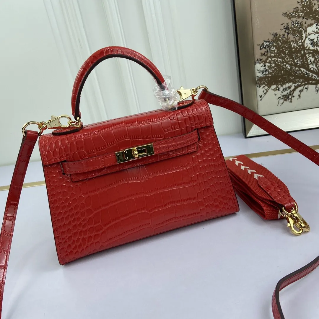 2021 Cowhide Alligator Leather Contracted Fashion Hand Lading Shoulder Inclined Shoulder Bag Leather Kelly Bag Handbag 10 Colors
2021 Cowhide Alligator Leather Contracted Fashion Hand Lading Shoulder Inclined Shoulder Bag Leather Kelly Bag Handbag 10 Colors