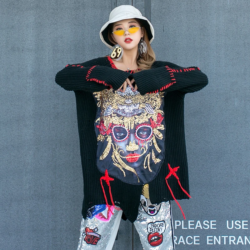 Thai Tide brand retro heavy work sequin patch tassel irregular personality sweater female long section wearing sweater
Thai Tide brand retro heavy work sequin patch tassel irregular personality sweater female long section wearing sweater