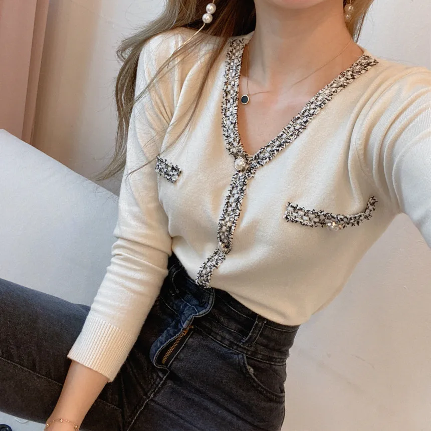 Casual Knitted Female Autumn Winter Loose Long Sleeve V Neck Sweater Basic White Pearl Buttons Korean Style Women's Tops 2021
Casual Knitted Female Autumn Winter Loose Long Sleeve V Neck Sweater Basic White Pearl Buttons Korean Style Women's Tops 2021