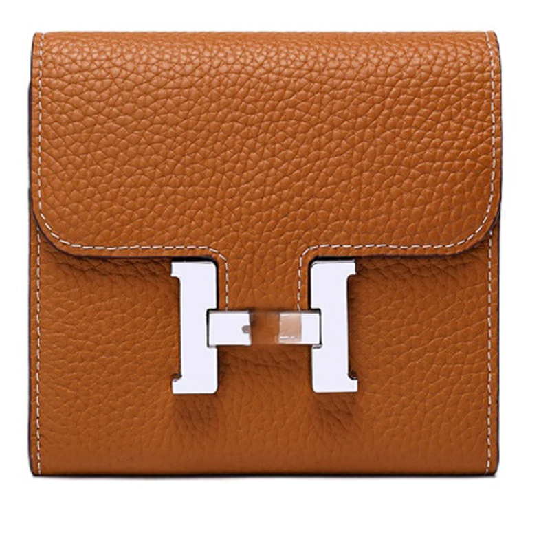 The first layer of cowhide short ladies wallet 2021 new lychee pattern leather wallet fashion soft leather clutch 
The first layer of cowhide short ladies wallet 2021 new lychee pattern leather wallet fashion soft leather clutch