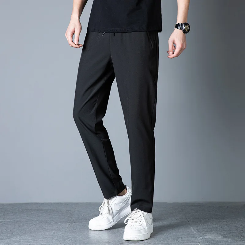 Ice silk elastic spring and autumn casual trousers men's self-cultivation solid color men's pants sports feet pants men
Ice silk elastic spring and autumn casual trousers men's self-cultivation solid color men's pants sports feet pants men