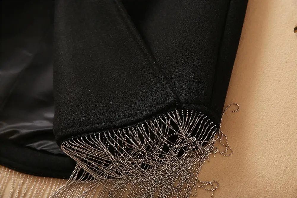 European and American women's wear 2020 winter new style Long sleeve lapel pin bead tassel lace-up Fashionable woolen coat 
European and American women's wear 2020 winter new style Long sleeve lapel pin bead tassel lace-up Fashionable woolen coat