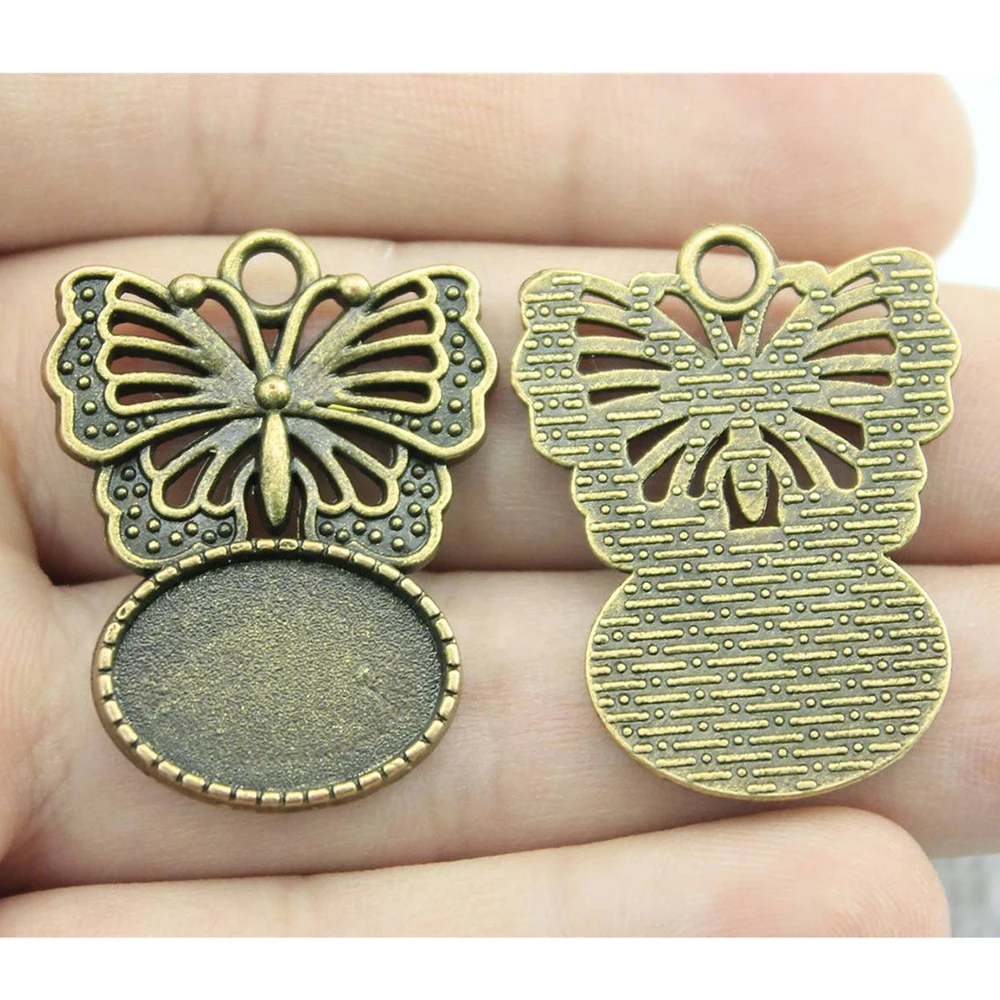 

WYSIWYG 5pcs 13x18mm Inner Size 2 Colors Antique Bronze Antique Silver Color Butterfly Oval Cameo Cabochon Base Setting Charms