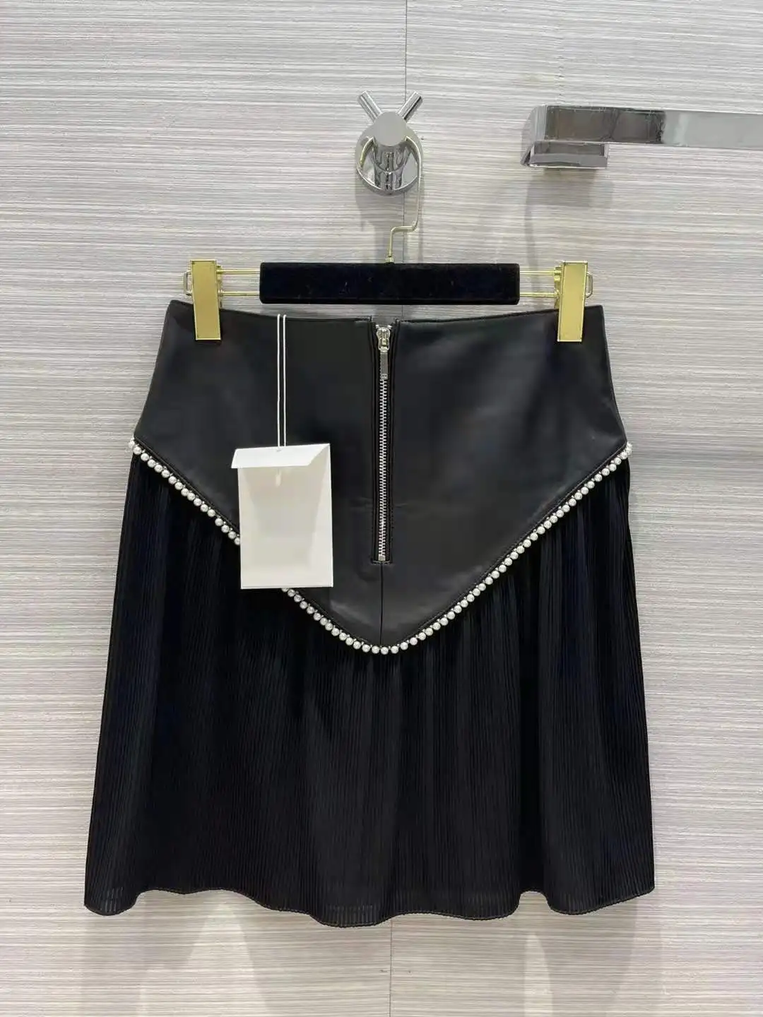 Женская юбка из хлопка и кожи, черная юбка в стиле пэчворк, осень 2021
Женская юбка из хлопка и кожи, черная юбка в стиле пэчворк, осень 2021