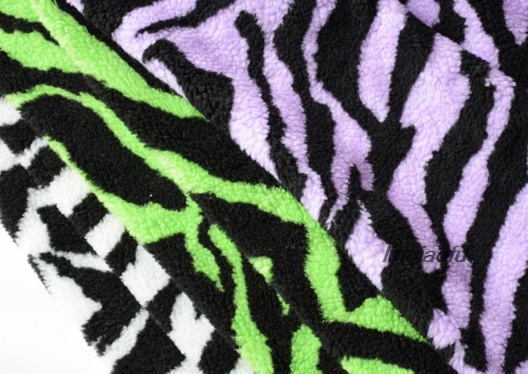 Spot supply jacquard horse grain lamb hair granular fleece garment plush fabric 
Spot supply jacquard horse grain lamb hair granular fleece garment plush fabric