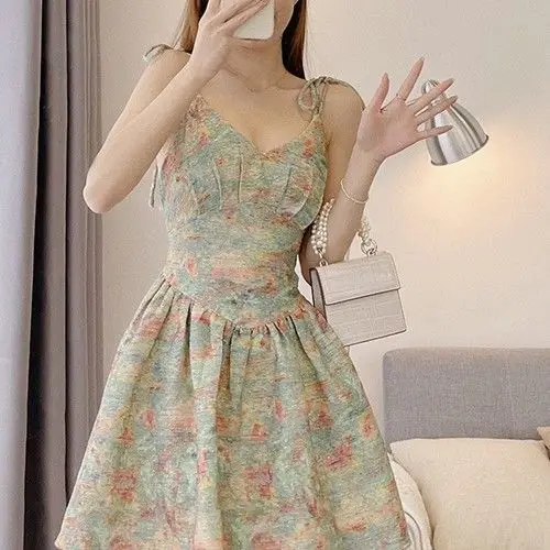 Summer new French floral high waist strap princess dress dress female design sense niche small flower bud skirt
Summer new French floral high waist strap princess dress dress female design sense niche small flower bud skirt