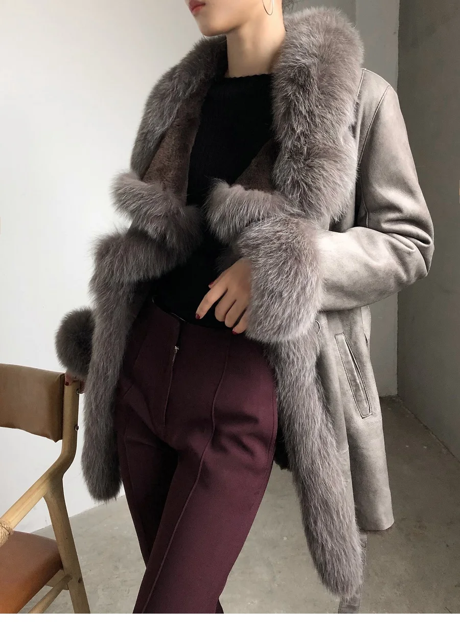 Women leather coat Lamb fur coat Female medium slim fox fur collar fur coat leather Casual style Genuine Leather
Women leather coat Lamb fur coat Female medium slim fox fur collar fur coat leather Casual style Genuine Leather