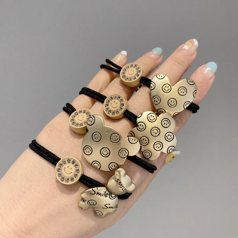 Vintage Smile Face Hair Ties Metal Bear Elastic Hair Bands For Women Golden Flower Alloy Hair Accessories Headband Wholesale
Vintage Smile Face Hair Ties Metal Bear Elastic Hair Bands For Women Golden Flower Alloy Hair Accessories Headband Wholesale
