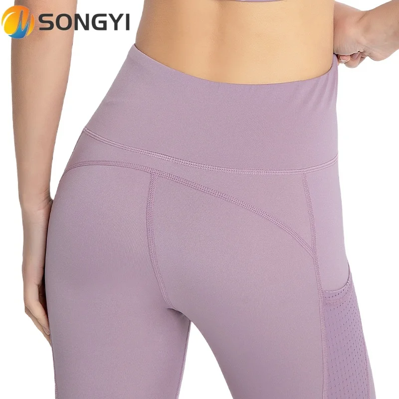 SONGYI Spring 2021 New Seamless Mesh Yoga Pants Women Breathable Pocket Tight Pants Quick Drying Hip Lifting Running Pants Y284
SONGYI Spring 2021 New Seamless Mesh Yoga Pants Women Breathable Pocket Tight Pants Quick Drying Hip Lifting Running Pants Y284