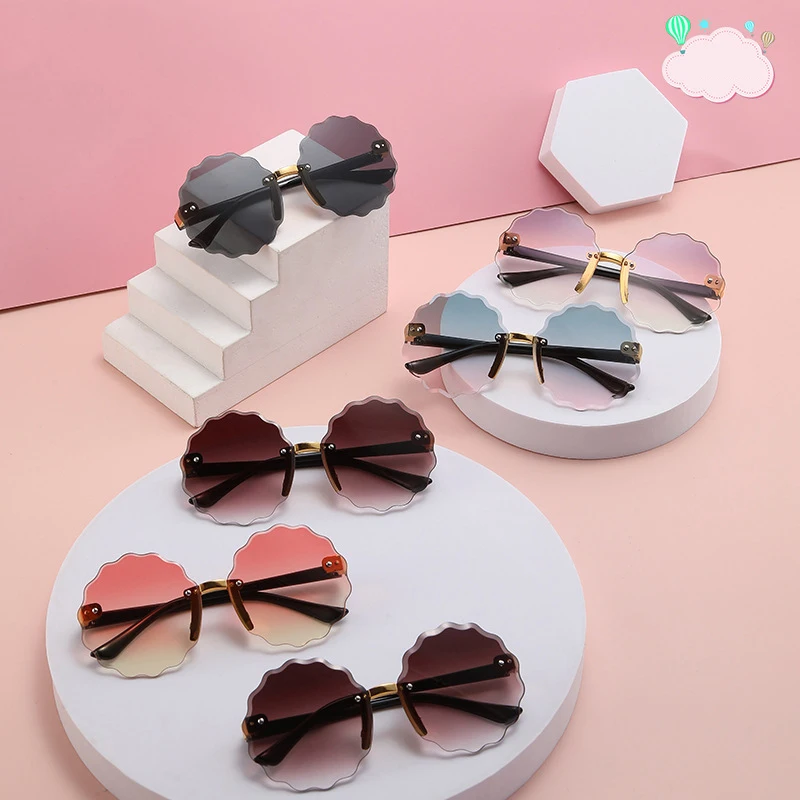 Children's Retro Graudal Rimless Sunglasses Wave Cut-edge Fashion Shade Sun Glasses for Girls New Frameless Party Travel Gift
Children's Retro Graudal Rimless Sunglasses Wave Cut-edge Fashion Shade Sun Glasses for Girls New Frameless Party Travel Gift