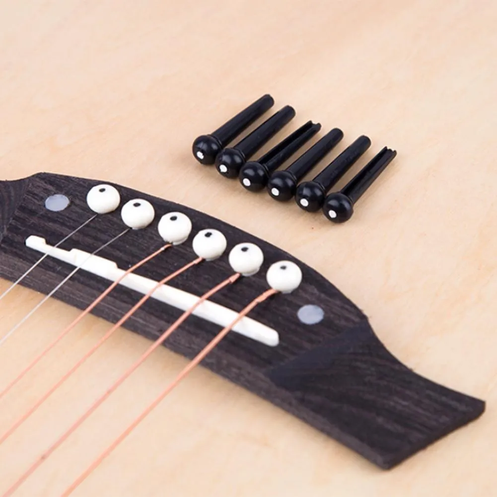 6 Pcs Acoustic Guitar Bridge Pins Plastic String End Peg Connectors With Black Dot Enhancing Six Seconds Sustain
6 Pcs Acoustic Guitar Bridge Pins Plastic String End Peg Connectors With Black Dot Enhancing Six Seconds Sustain